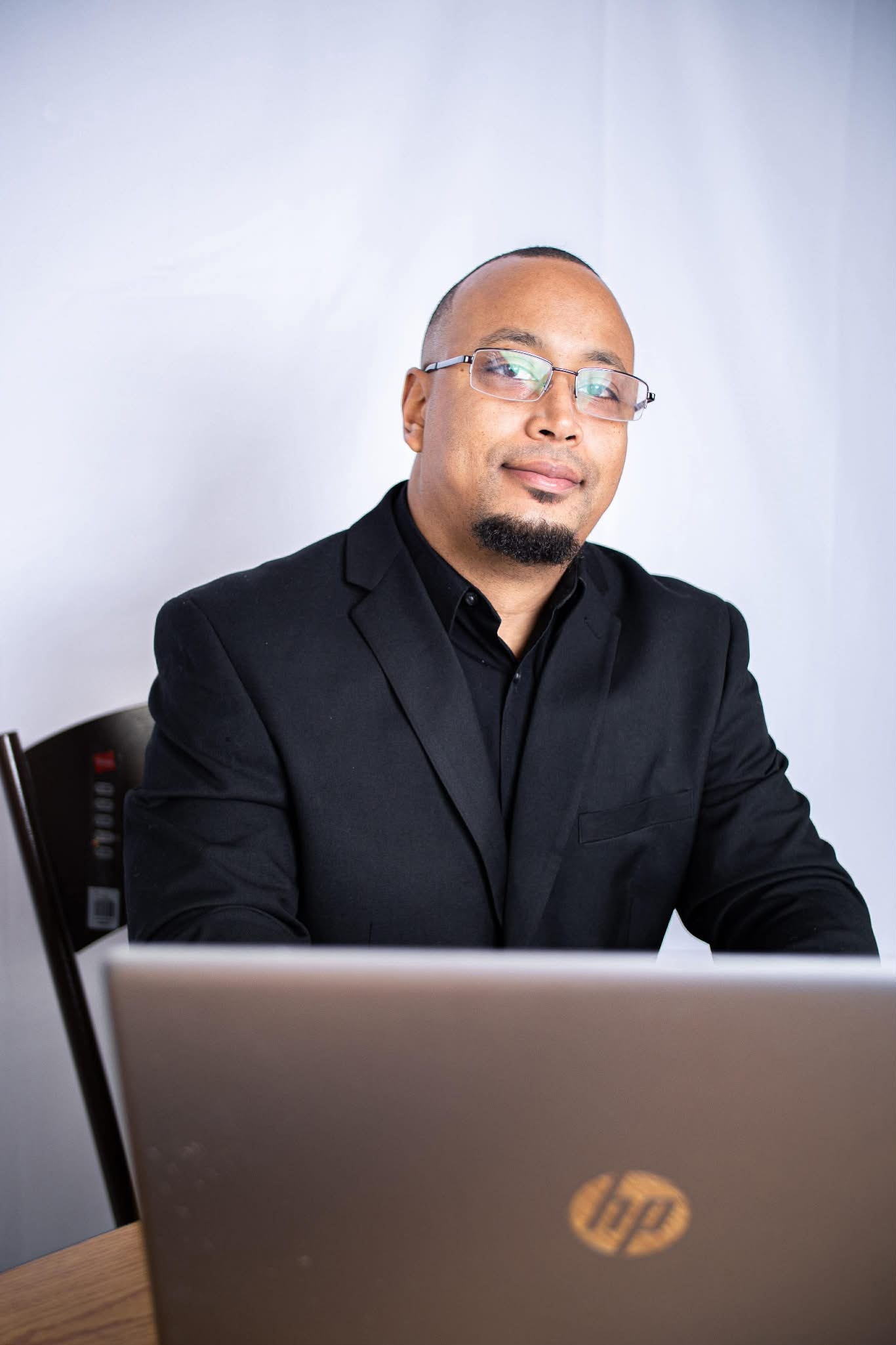 Tate — Founder & Financial Consultant